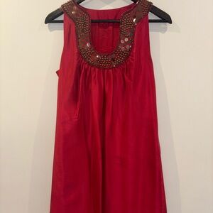 Red Sleeveless Dress with Embellished Neckline